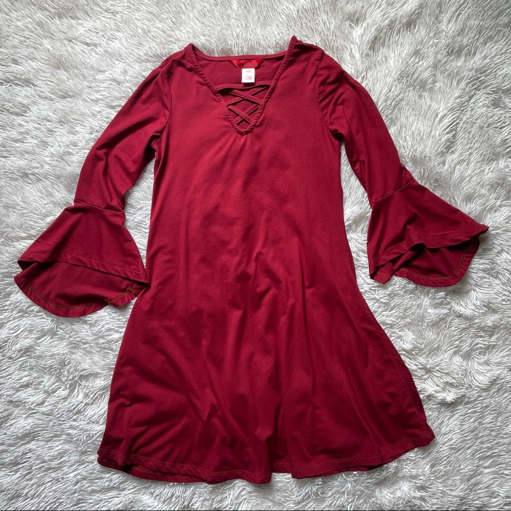 Super soft girls dress with crisscross neck line.